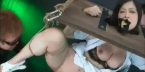 Asian In A Stockade Made to Orgasm (Fetish Fatale)