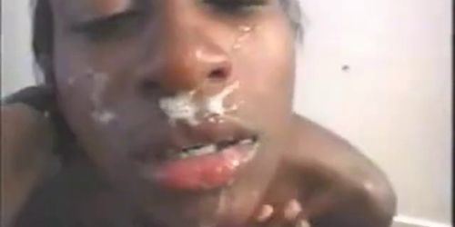 Nasty black bitch sucks cock licks ass and get spitted on - video 2 (amateur )