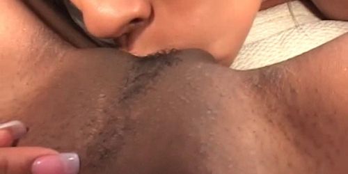 Sexy ebony gets lesbo pussy licked in close-up