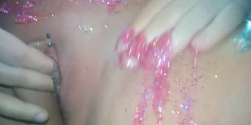 Glitter girl cums on her fingers