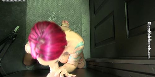 Anna Bell Peaks giving blowjobs to strangers at a gloryhole booth