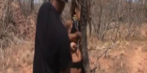 Two masters force African slave to suck cocks