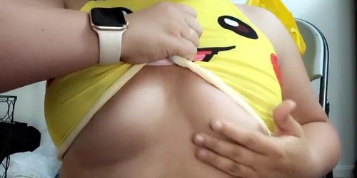 Teen Pokémon trainer wears pikachu and plays with her small boobs and nipple piercings