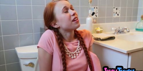 Tiny redhead stuck on the toilet then gets fucked hard