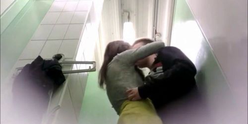 couple caught in fitting room