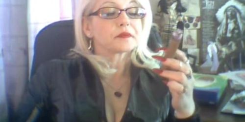 Amazing blonde Milf blowing sexy cigar smoke