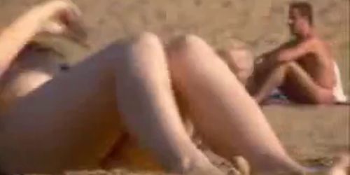 Naked woman with perfect pussy and ass at the beach