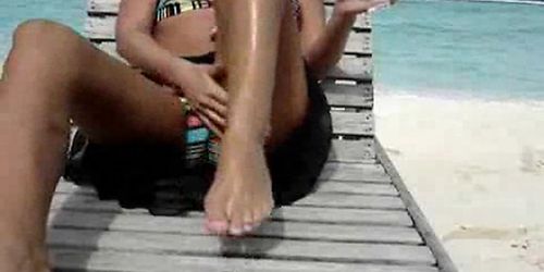 Sexy wife masturbating at the beach