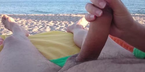 Handjob at the beach revisited