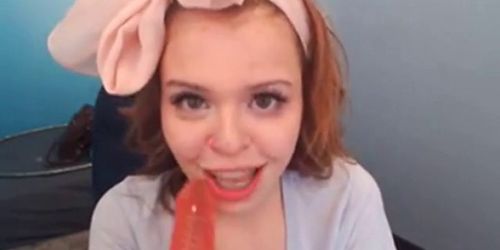 Hot redhead sucks dildo on webcam