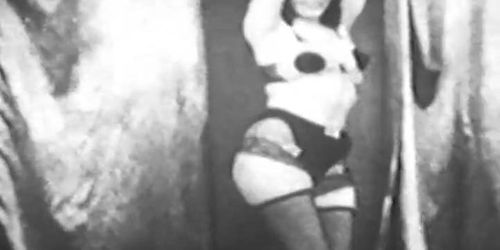 Black and white footage of Betty Page in bondage (Anna Malle)