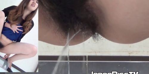 JAPAN PISS TV - Pretty Japanese babe with hairy pussy pissing hard - Tnaflix.com