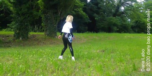 Latex catsuit under jeans shorts and tee shirt