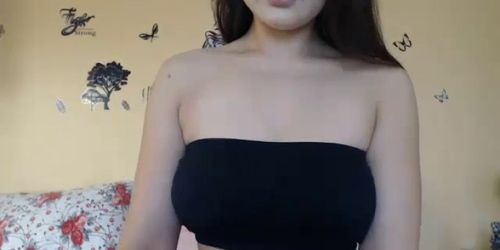 Sexy brunette with amazing boobs on cam