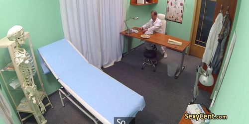 Doctor fucks brunette in hospital office