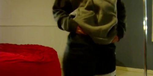 Silly girl performing a striptease