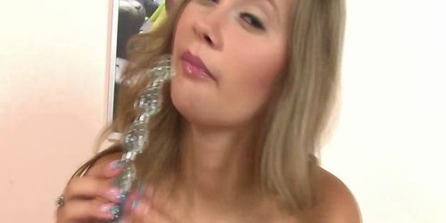 Babe bald pussy loves sex beads used on her pussy