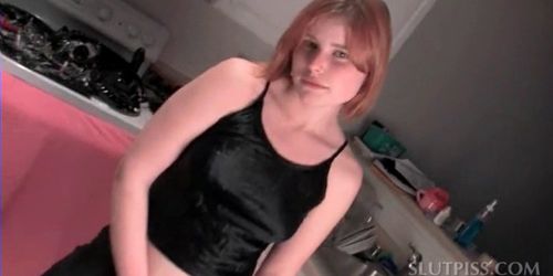 Redhead teeny stripping naked fills glasses with her piss