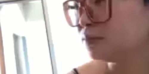 Chinese Milf smoking a slim cigarette while chatting with her screw boy 