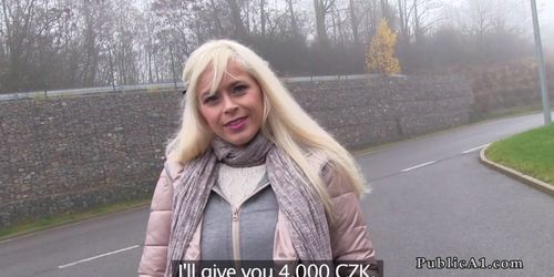 Blonde gets cock between big tits in public