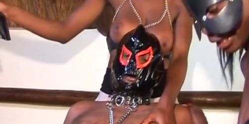 Chained black slave gets dick sucked before he fucks kinky ebony chicks