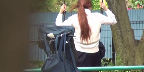 Asian teens piss outdoors