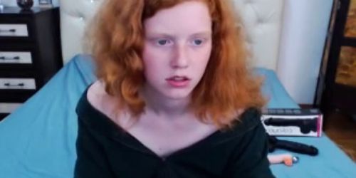 Natural redhead teen shows her feet, sucks her toes and inserts dildo