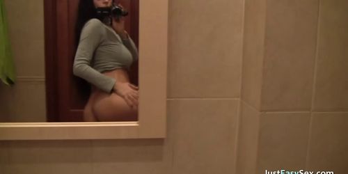 Bushy Babe Masturbates in the Bathroom