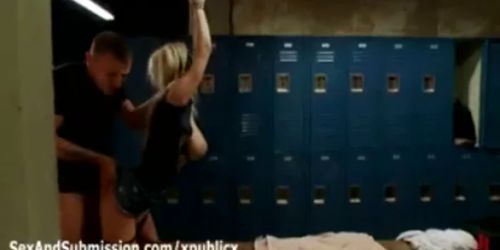 Tied busty blonde gangbanged in locker room