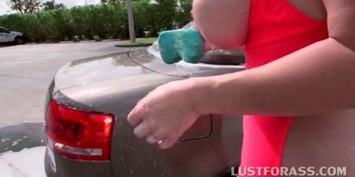 Big ass MILF sucking dick at the car wash