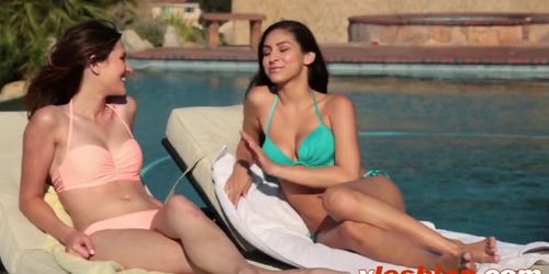 Hot lesbians fondel around with each other at poolside