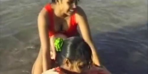 2 Indian girls with white guy in beach have fun blowjob 