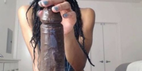 Busty ebony sucks a fake black cock - video 2