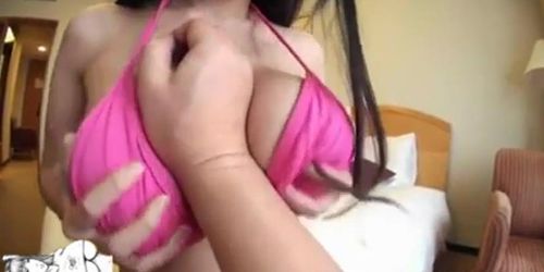 Busty Japanese Girl in Pink Bikini