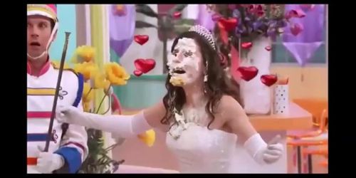 Bride accidentally gets a cake in her face