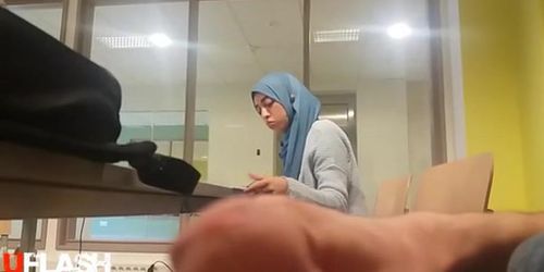 dickflash next to arab girl in library