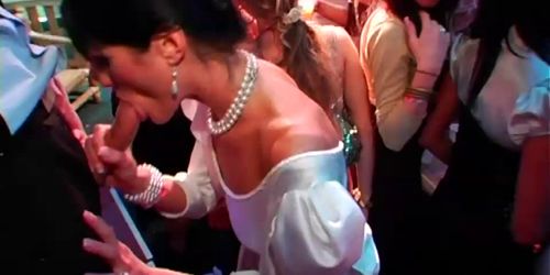 DRUNKSEXORGY - Horny brunette bride eats a big cock in public