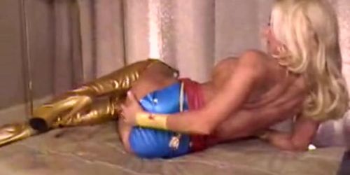 Blonde latex wonder woman stripping and teasing the hell out of the viewer, no sex (Alisa Kiss)