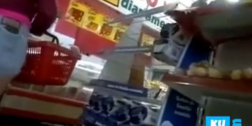 Brazilian blonde of shorts in supermarket