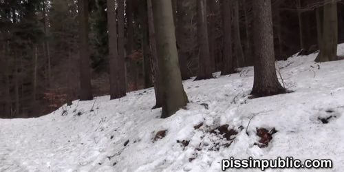 Girls in need skate around in the snow to find a proper place to have a pee