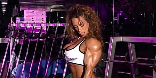 bodybuilder mature in training center with high heels