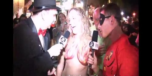 goofy guys interviewing naked girls on the streets of key west fantasy fest