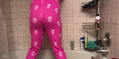 Peeing her pajamas 