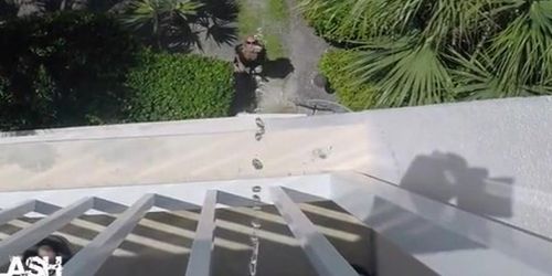 Pissing on his girlfriend 3 stories down