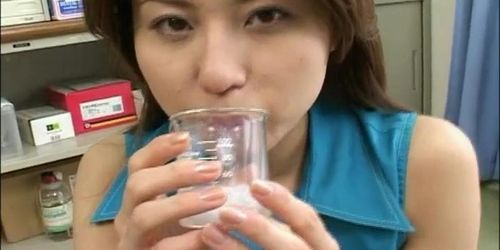 Girl collects cum in a beaker and gives a good show