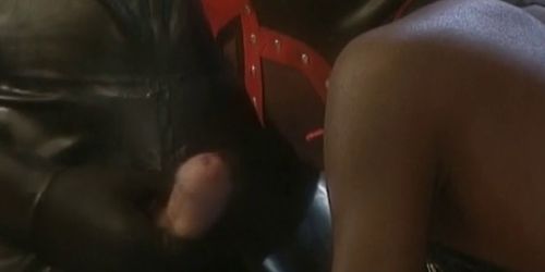 Black girl in leather hood gets anal