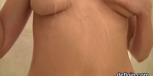 Kissable kitten gapes slim snatch and loses virginity