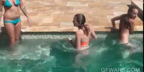 Horny college girls stripping naked in the pool