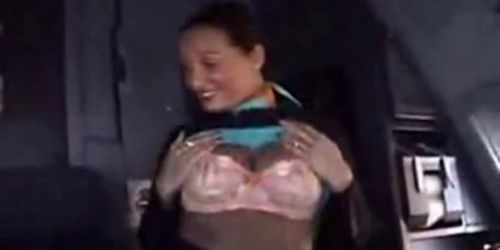 Stewardess strips for crew in flight