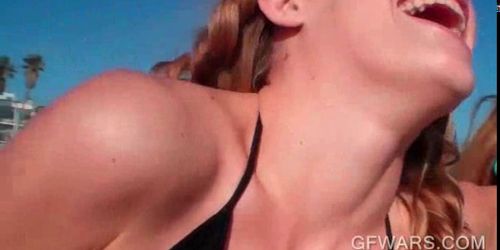 Cute teens fucking in threesome at the beach